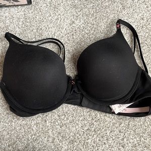 Doesn’t fit, brand new with tags, black 34 C